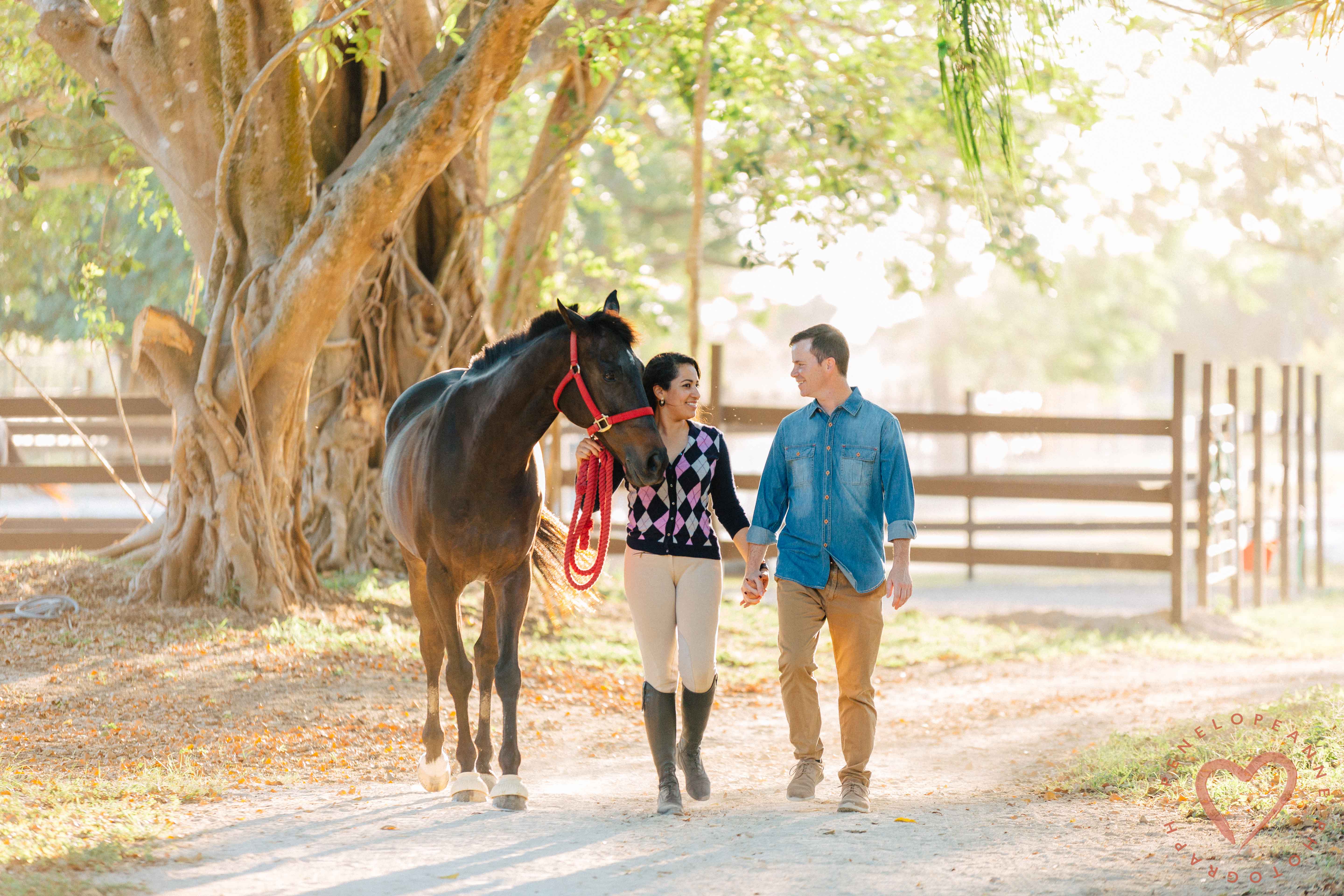 Bride and Groom walking with horse in Homestead Florida