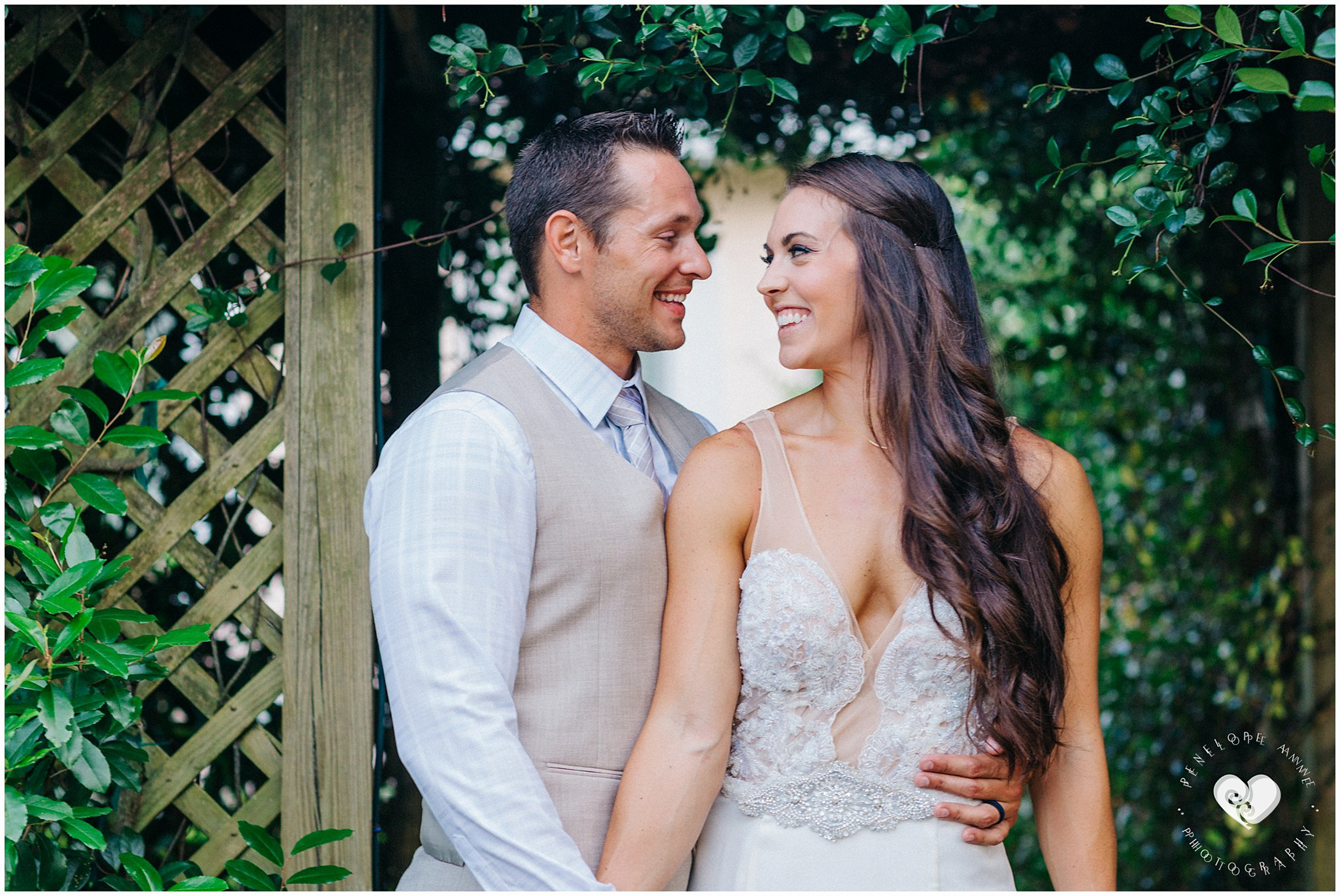 bride and groom hugging