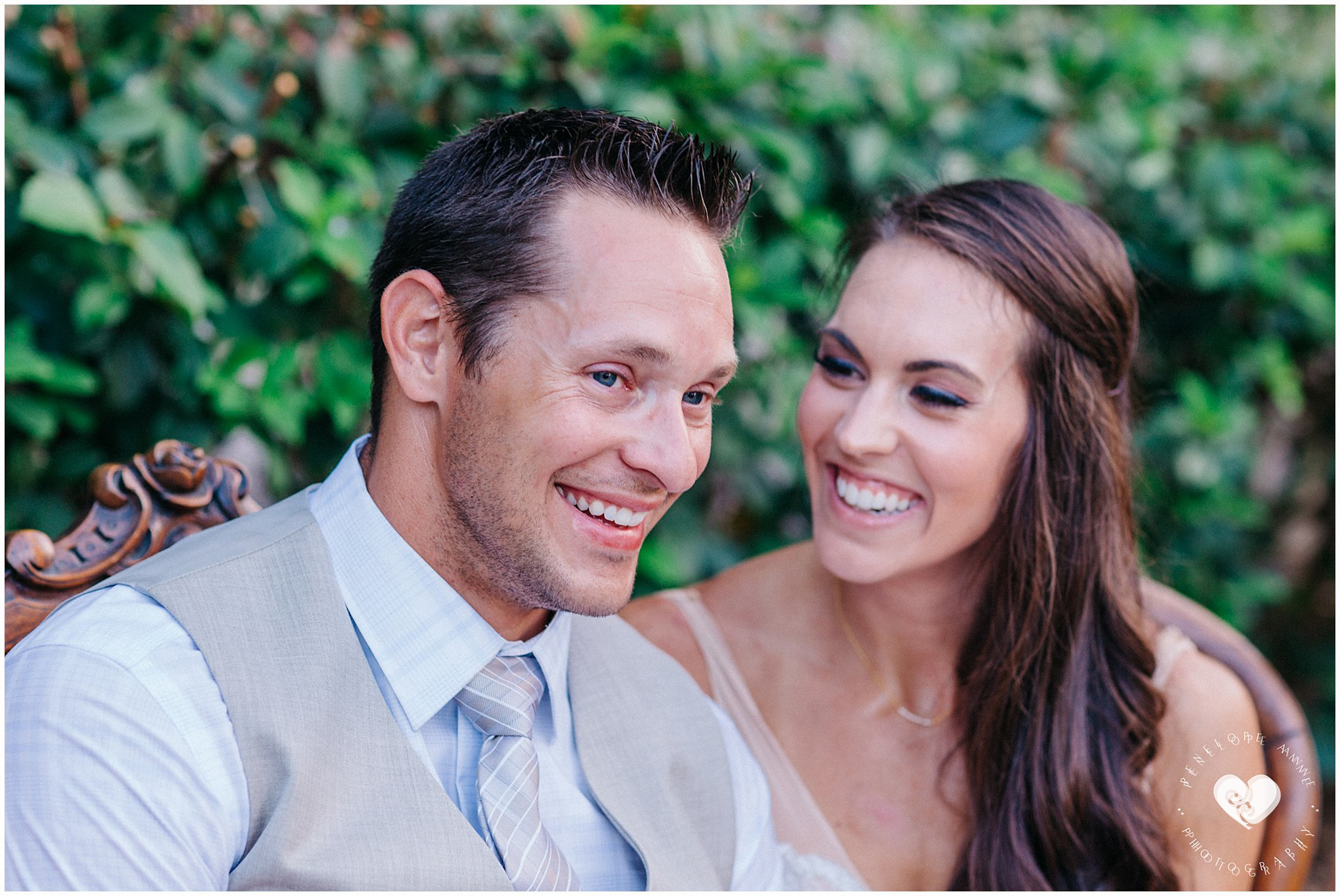 bride and groom laughing