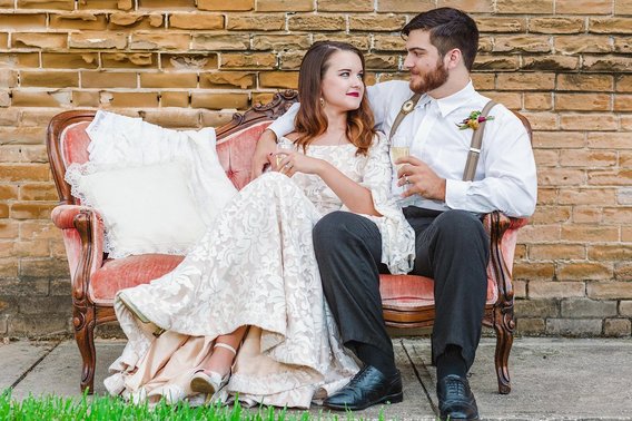 Bride and Groom on Vintage Couch
